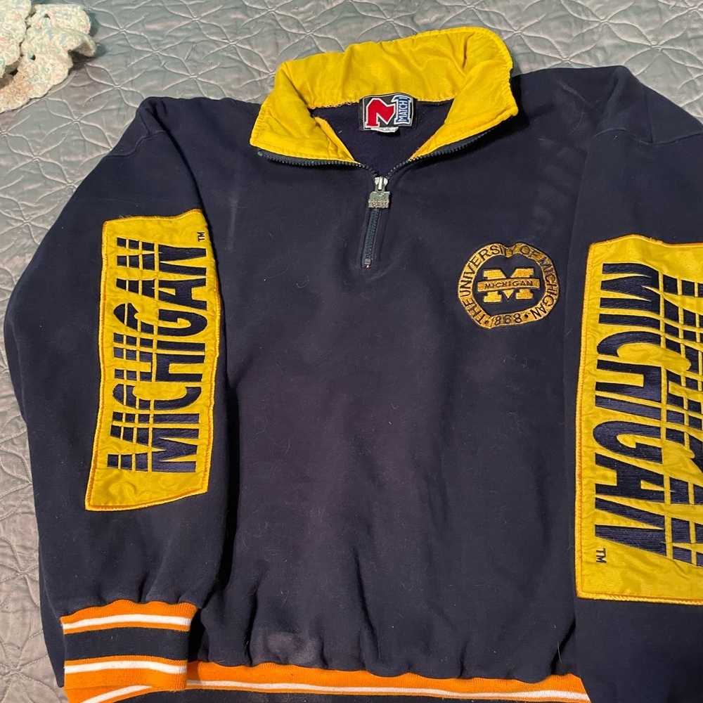 Match 1 University of Michigan half zip sweatshirt.